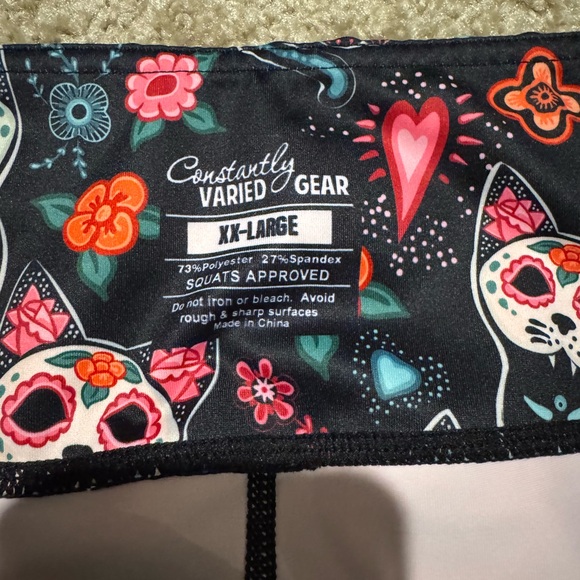 Constantly Varied Gear Black and Pink Leggings with Whimsical Design - Picture 2 of 2